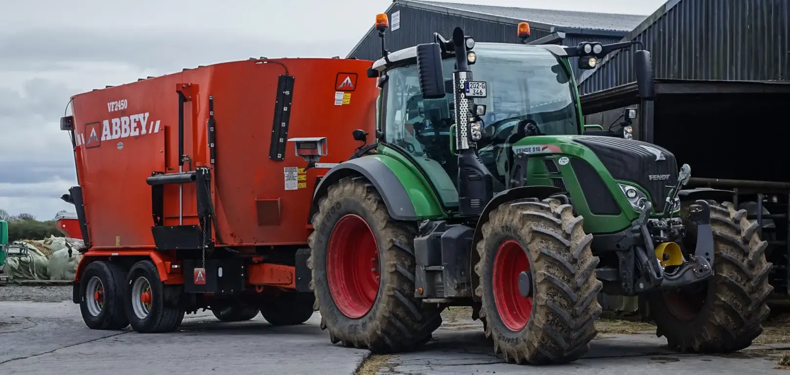 abbey-machienry-twin-auger-diet-feeder-and-tractor
